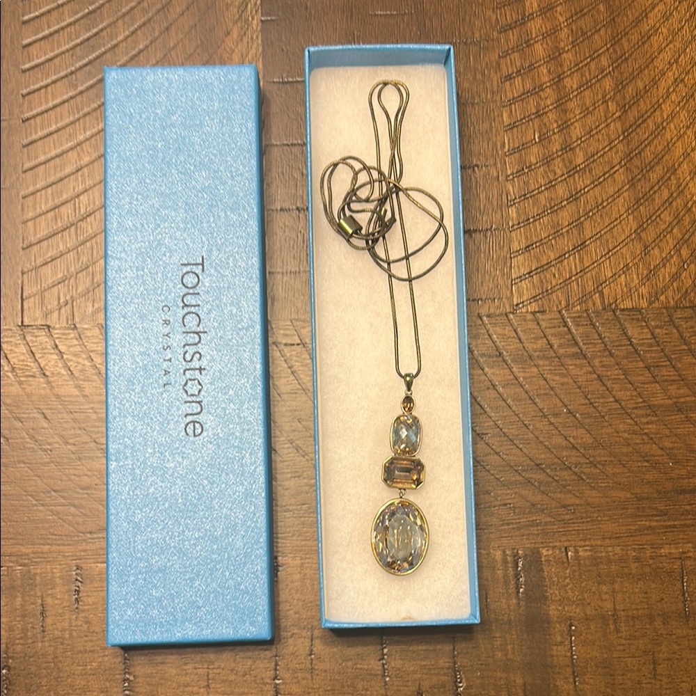 Touchstone Crystal bronze necklace with four stones.